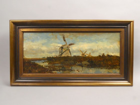 Gezicht op de drie molens bij Giethoorn