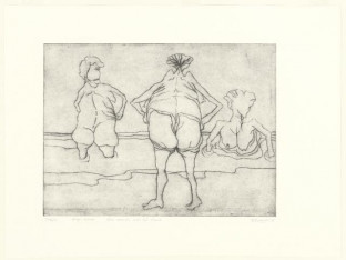 Drie mensen aan het strand