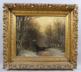 Watermolen in winterlandschap